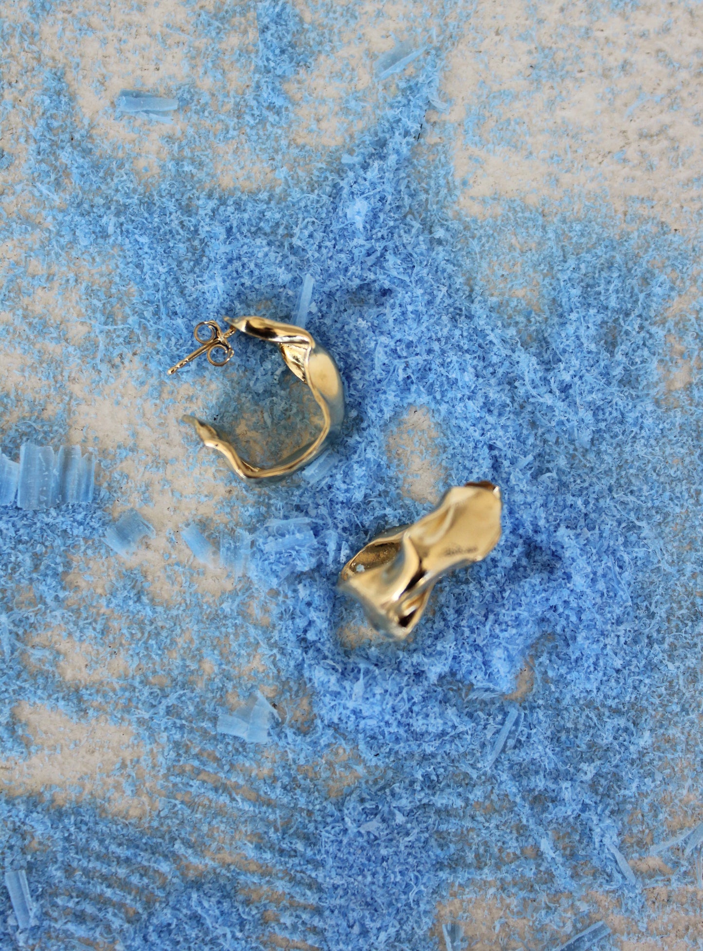 Sculptural organic small hoop earrings in gold vermeil.