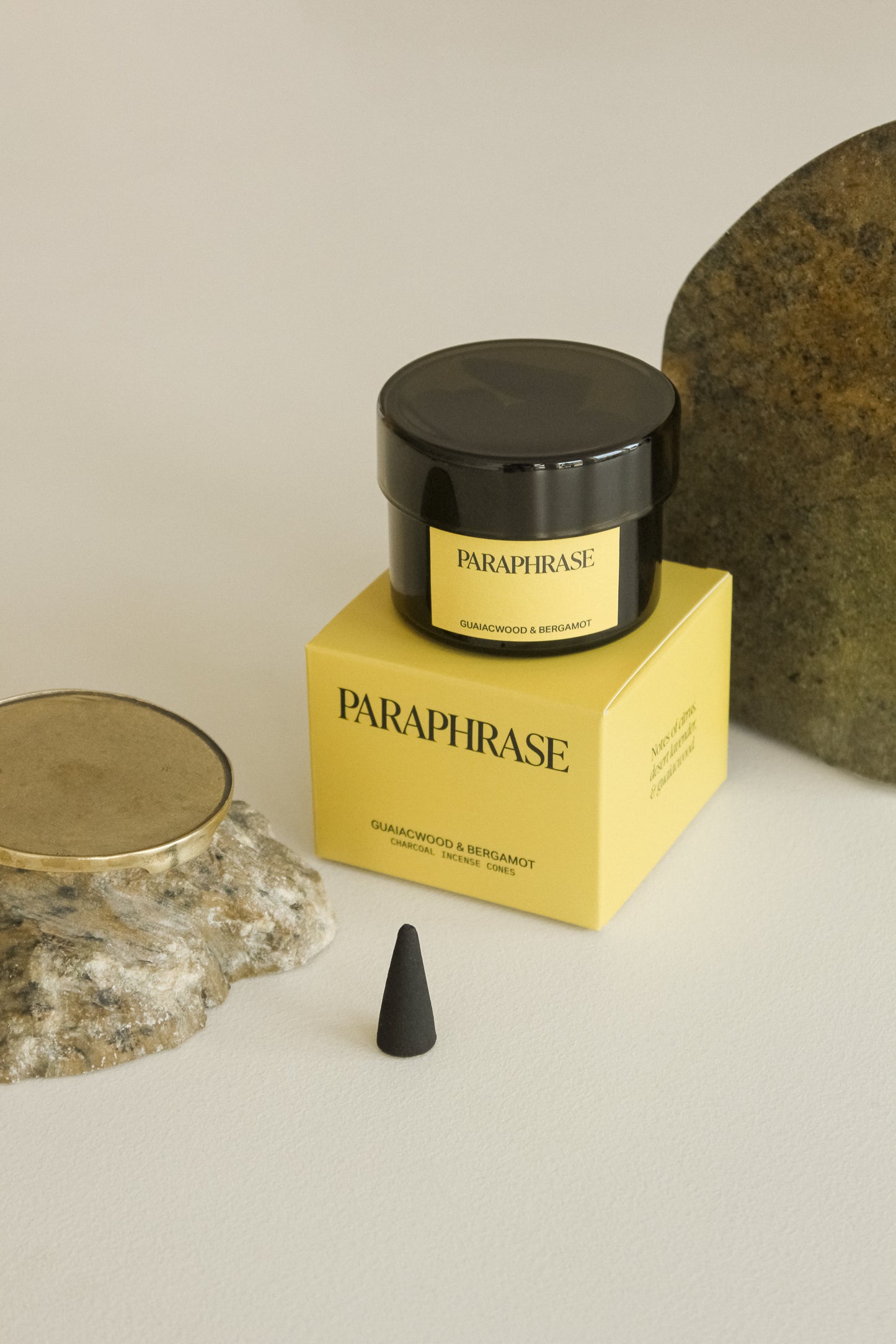 Incense cones in a smoke glass lidded jar.