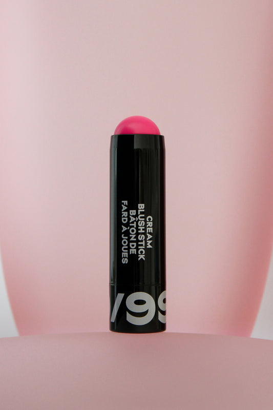 Cream blush stick with pink shade on a pink background