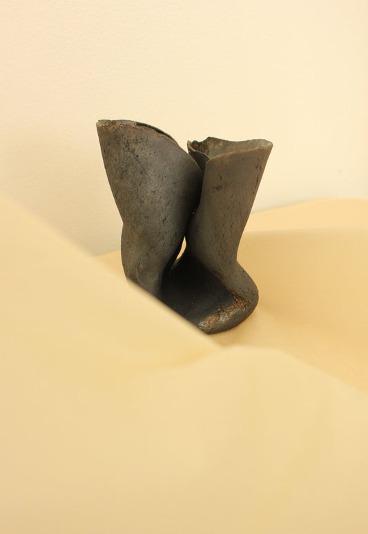Hand built, organic black clay sculptural vase.